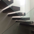 Floating timber stair with glass balustrade