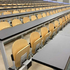 Polypropylene tip-up chair upholstered